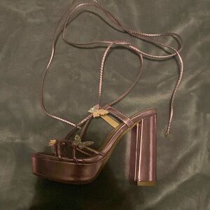 Size 5 1/2 heels, pink metallic, never worn and with price tag